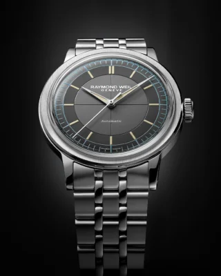 Swiss-made craftsmanship meets vintage charm. 

The anthracite sector dial gives it a sleek, modern yet classic feel, while the light blue minute track adds a pop of color and contrast. The vintage yellow Super-Luminova® on the indexes and hands likely enhances legibility while giving it that aged, heritage-inspired look. 

Explore the Millesime collection today.

#RAYMONDWEIL #PrecisionMovements #RWMillesime #Luxurywatches #AutomaticWatch #SwissWatch #Watch #SwissMade #IndependentBrand